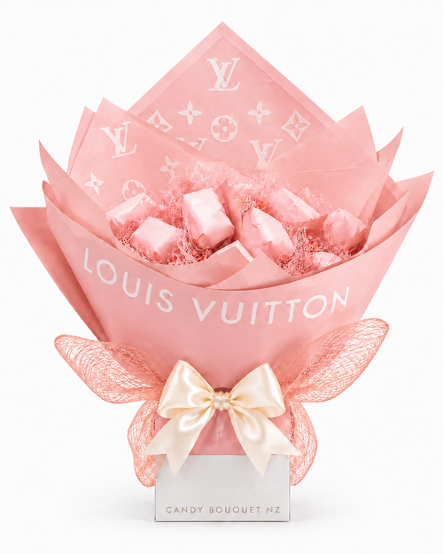 Baby Girl Louie pink candy bouquet with white Candy Bouquet NZ base