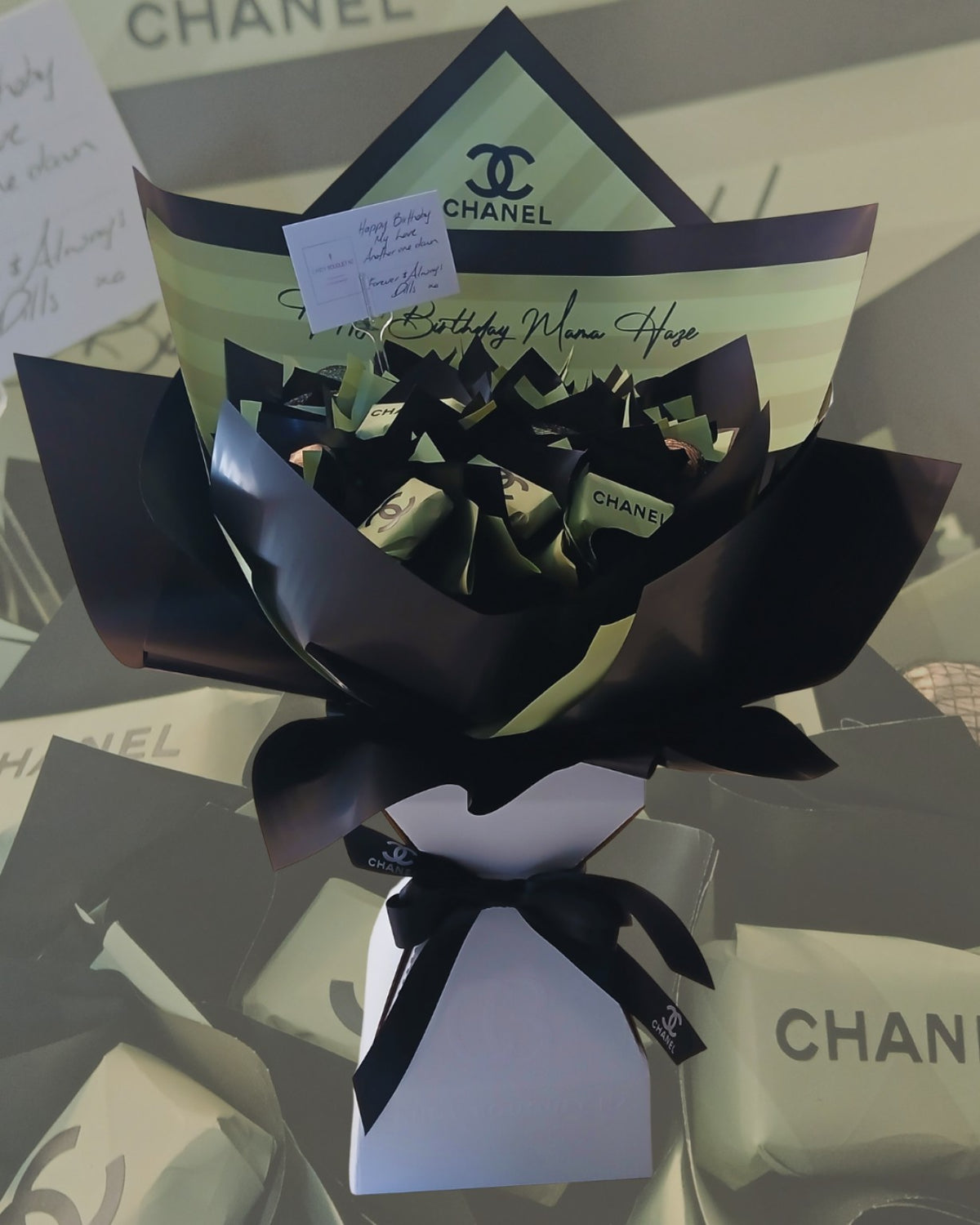 Black and green Chanel-themed designer candy bouquet
