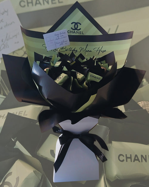 Black and green Chanel-themed designer candy bouquet